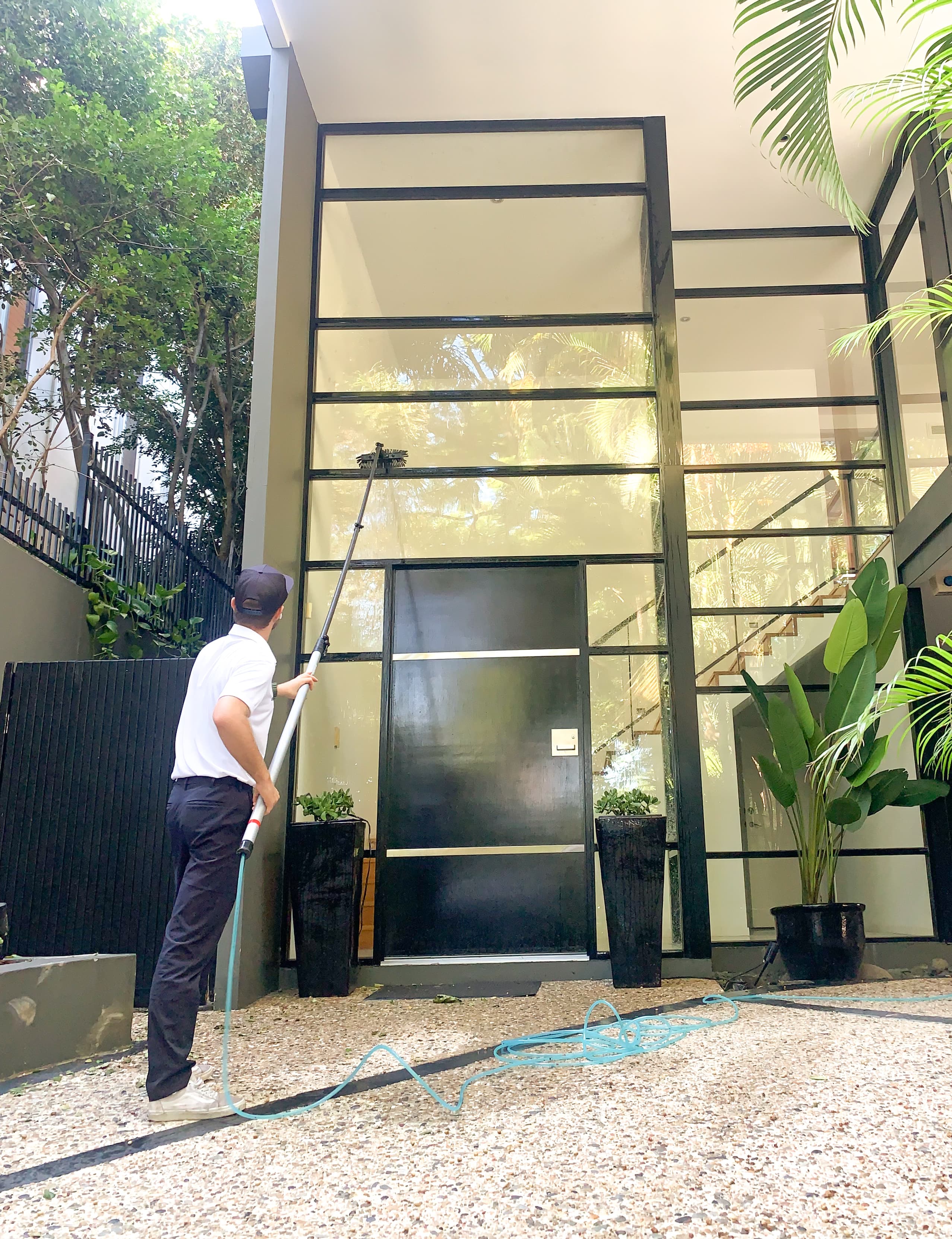 Kenni cleaning windows — Zesty Window Cleaning Gold Coast